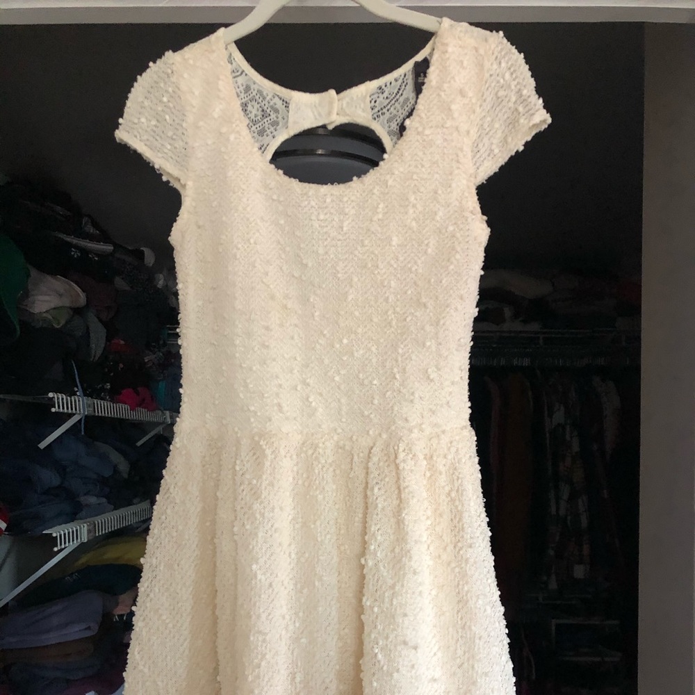 Jessica Simpson cream mini dress. Size small. Open key hole back!